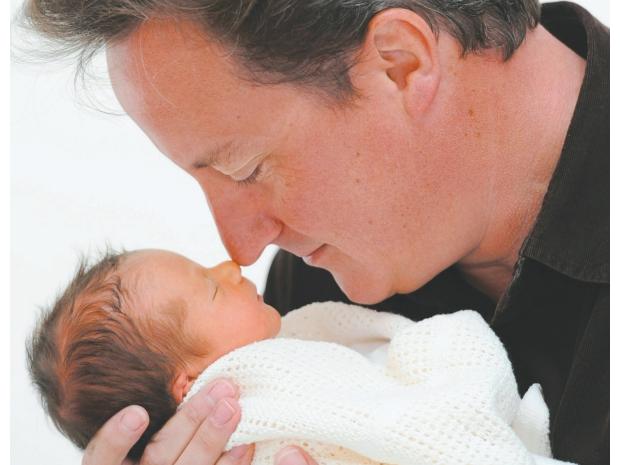 Cameron%20with%20newborn%20daughter.jpg