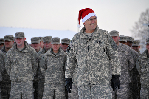 Casey%20with%20Santa%20hat%20before%20troops.jpg