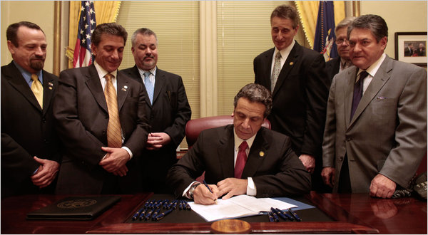 Cuomo%20signs%20bill.jpg