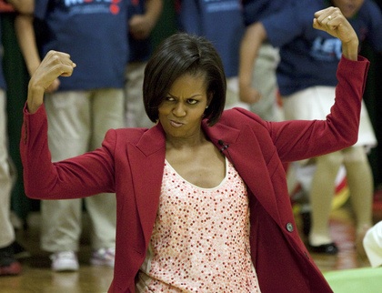 MIchelle%20flexes%2C%20with%20furious%20expression.jpg