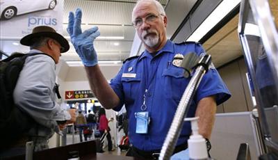 TSA%20agent%20extending%20gloved%20finger.jpg