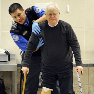 TSA%20agent%20groping%20elderly%20crippled%20man.jpg